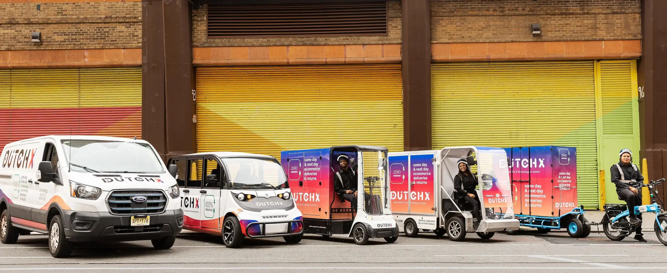 Delivery vehicles at sunset